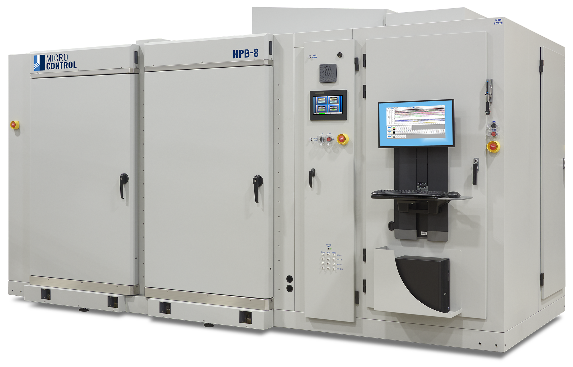 Micro Control HPB-8 industrial testing equipment featuring large cabinets, a touchscreen interface, a computer monitor on an adjustable arm, and an emergency stop button.