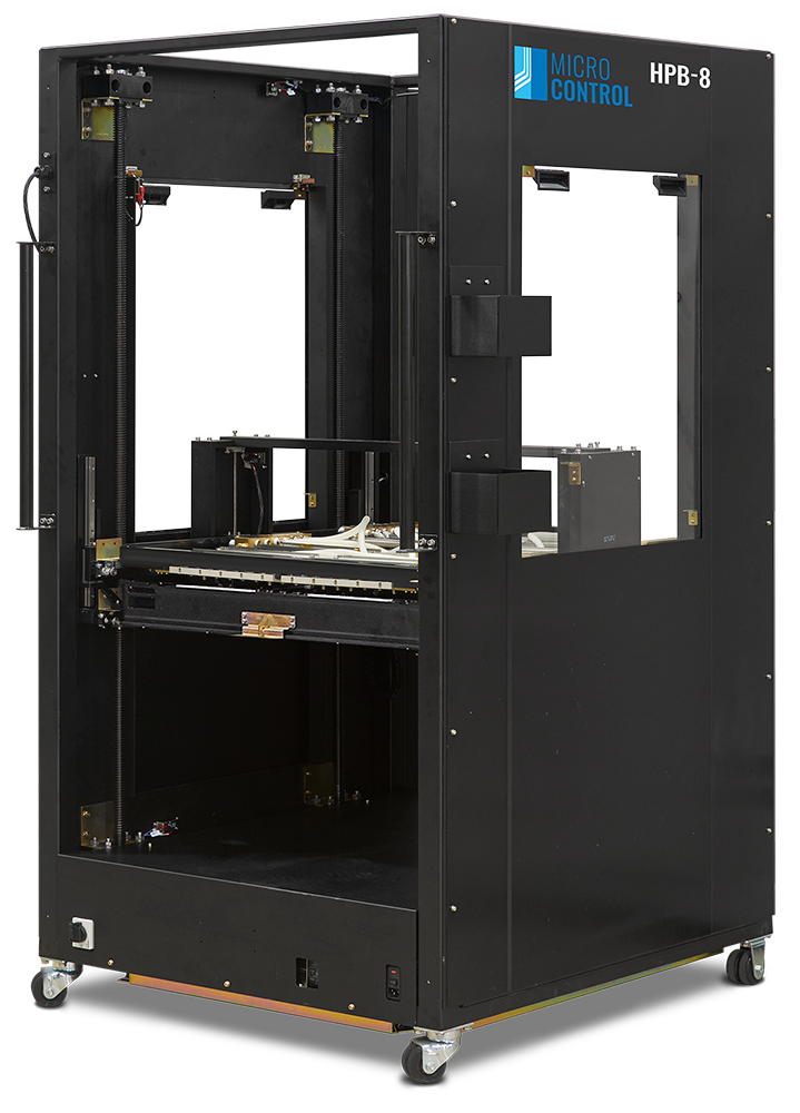Micro Control HPB-8 industrial testing station in a black metal enclosure on wheels.